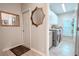 Convenient laundry room with washer, dryer, and ample storage at 12113 Marblehead Dr, Tampa, FL 33626