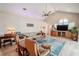 Spacious living area with high ceilings, brick feature wall, and access to pool area at 12113 Marblehead Dr, Tampa, FL 33626