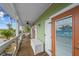 Private balcony with storage and partial ocean view at 12116 Lagoon Ln, Treasure Island, FL 33706