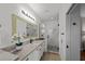 Clean bathroom, granite vanity, and walk-in shower at 12116 Lagoon Ln, Treasure Island, FL 33706