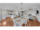 Open concept dining room with kitchen and living room views at 12116 Lagoon Ln, Treasure Island, FL 33706