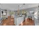 Spacious kitchen with island, stainless steel appliances, and white cabinetry at 12116 Lagoon Ln, Treasure Island, FL 33706