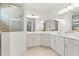 Elegant bathroom with double vanity and large shower at 12739 Rainwashed Loop, Parrish, FL 34219