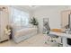 Bedroom with daybed, desk, and large mirror at 12739 Rainwashed Loop, Parrish, FL 34219