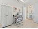 Home office with desk, chair, and built-in storage at 12739 Rainwashed Loop, Parrish, FL 34219