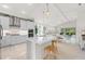 Spacious kitchen with modern white cabinets and island at 12739 Rainwashed Loop, Parrish, FL 34219