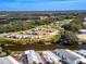 Aerial view of RV storage area near canal and homes at 170 S Saint Thomas Cir, Apollo Beach, FL 33572