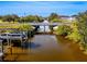 Peaceful canal view with a bridge and boat dock at 170 S Saint Thomas Cir, Apollo Beach, FL 33572
