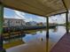 View from dock showing canal and neighboring properties at 170 S Saint Thomas Cir, Apollo Beach, FL 33572