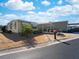 Yellow mobile home with carport, palm tree, and landscaped yard at 170 S Saint Thomas Cir, Apollo Beach, FL 33572
