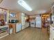 Galley kitchen with white appliances and wood cabinets at 170 S Saint Thomas Cir, Apollo Beach, FL 33572