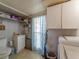 Functional laundry room with washer, dryer, and extra storage at 170 S Saint Thomas Cir, Apollo Beach, FL 33572