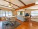 Spacious living room with hardwood floors, comfy sofas, and a large TV at 170 S Saint Thomas Cir, Apollo Beach, FL 33572