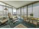 Sunroom with ample seating, dining table, and view of the outdoors at 170 S Saint Thomas Cir, Apollo Beach, FL 33572