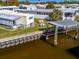 Waterfront manufactured home features a private dock and backyard at 170 S Saint Thomas Cir, Apollo Beach, FL 33572