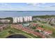 Wide aerial showcasing community with water views and resort style amenities at 1709 Edgewater Ln, Palmetto, FL 34221