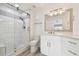 Clean bathroom with white vanity and glass shower at 1709 Edgewater Ln, Palmetto, FL 34221