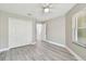 Spacious bedroom with double door closet and neutral wall colors at 1709 Edgewater Ln, Palmetto, FL 34221