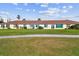 Rear view of the property showcasing a spacious patio area at 1709 Edgewater Ln, Palmetto, FL 34221