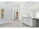 Newly renovated kitchen featuring white shaker cabinets and stainless steel appliances at 1709 Edgewater Ln, Palmetto, FL 34221