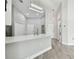 Modern kitchen with white cabinets and quartz countertops at 1709 Edgewater Ln, Palmetto, FL 34221