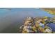 Waterfront community with various houses and boat docks at 1836 Venetian Point Dr, Clearwater, FL 33755