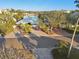 Mid-century modern home with waterfront access and palm trees at 1836 Venetian Point Dr, Clearwater, FL 33755