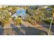 Mid-century modern home with private driveway and boat access at 1836 Venetian Point Dr, Clearwater, FL 33755