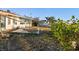 Spacious backyard with mature plantings and potential for outdoor enjoyment at 1836 Venetian Point Dr, Clearwater, FL 33755