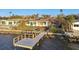 Private dock overlooking calm water, next to a waterfront home at 1836 Venetian Point Dr, Clearwater, FL 33755