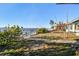 House exterior with waterfront view at 1836 Venetian Point Dr, Clearwater, FL 33755
