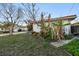 House exterior with mature landscaping at 1836 Venetian Point Dr, Clearwater, FL 33755