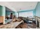 Living Room undergoing renovation with exposed walls and flooring at 1836 Venetian Point Dr, Clearwater, FL 33755