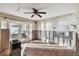 Living room with water damage and exposed walls, needs renovation at 1836 Venetian Point Dr, Clearwater, FL 33755
