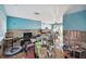 Living room with fireplace, needs renovation, plenty of space at 1836 Venetian Point Dr, Clearwater, FL 33755