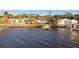 Waterfront home with private dock and lush landscaping at 1836 Venetian Point Dr, Clearwater, FL 33755