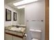 Bathroom with updated vanity and tiled shower at 2511 Dolly Bay Dr # 303, Palm Harbor, FL 34684