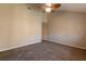 Bright bedroom with ceiling fan and carpeted floor at 2511 Dolly Bay Dr # 303, Palm Harbor, FL 34684