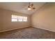Bedroom with window and wall-to-wall carpeting at 2511 Dolly Bay Dr # 303, Palm Harbor, FL 34684