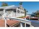 Community clubhouse near the waterfront with a porch at 2511 Dolly Bay Dr # 303, Palm Harbor, FL 34684