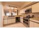 Modern kitchen with stainless steel appliances and ample cabinetry at 2511 Dolly Bay Dr # 303, Palm Harbor, FL 34684