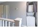 Stackable washer and dryer in convenient closet at 2511 Dolly Bay Dr # 303, Palm Harbor, FL 34684