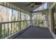 Screened porch overlooking tranquil wooded area at 2511 Dolly Bay Dr # 303, Palm Harbor, FL 34684
