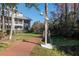 Brick walkway leading to the waterfront community at 2511 Dolly Bay Dr # 303, Palm Harbor, FL 34684