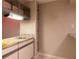 Convenient wet bar with sink and additional cabinetry at 2511 Dolly Bay Dr # 303, Palm Harbor, FL 34684