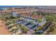 Aerial view highlighting townhome's location within a community near water at 262 Madeira Cir, Tierra Verde, FL 33715