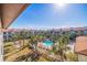 Aerial view showcasing the community pool and surrounding buildings at 262 Madeira Cir, Tierra Verde, FL 33715