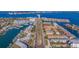 Wide aerial view of waterfront property and surrounding neighborhood at 262 Madeira Cir, Tierra Verde, FL 33715