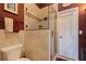 Bathroom with walk-in shower and neutral tile at 262 Madeira Cir, Tierra Verde, FL 33715