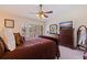 Main bedroom with king-size bed and dresser at 262 Madeira Cir, Tierra Verde, FL 33715